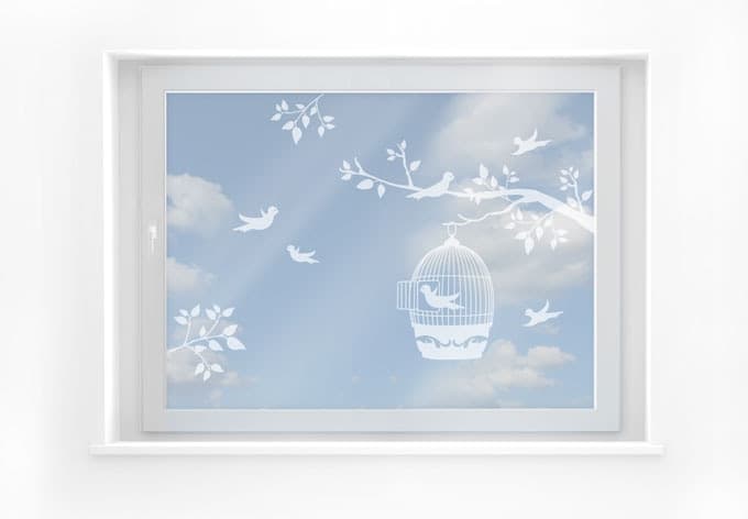 Decoración de ventana rama con jaula
