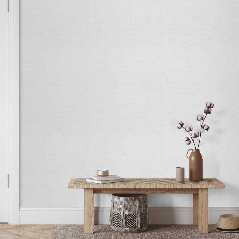 Papel pintado no tejido de color gris claro liso con una fina textura de lino, sutilmente moderno y atemporal