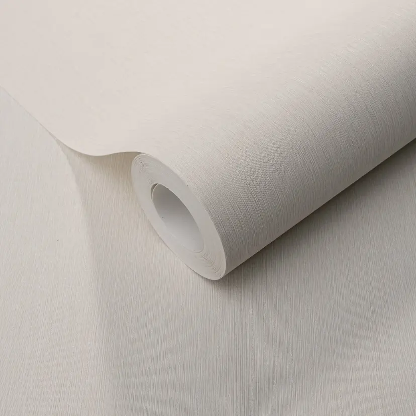 Papel pintado no tejido con textura longitudinal fina en color crema