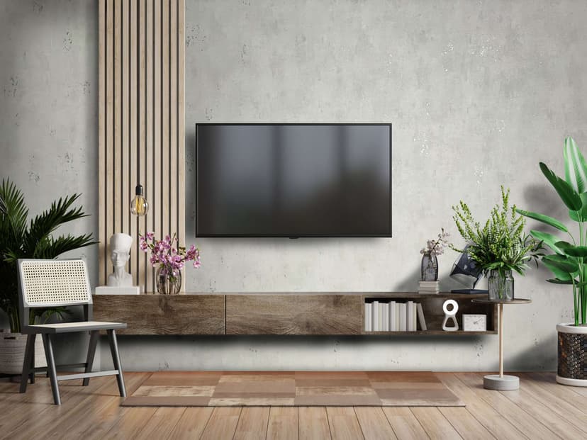 Papel pintado no tejido de textura gris ligeramente brillante con aspecto de hormigón