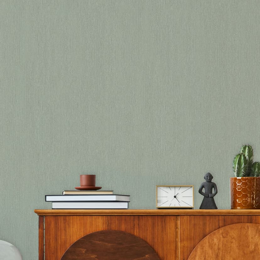 Papel pintado no tejido de aspecto textil con superficie texturada verde liso