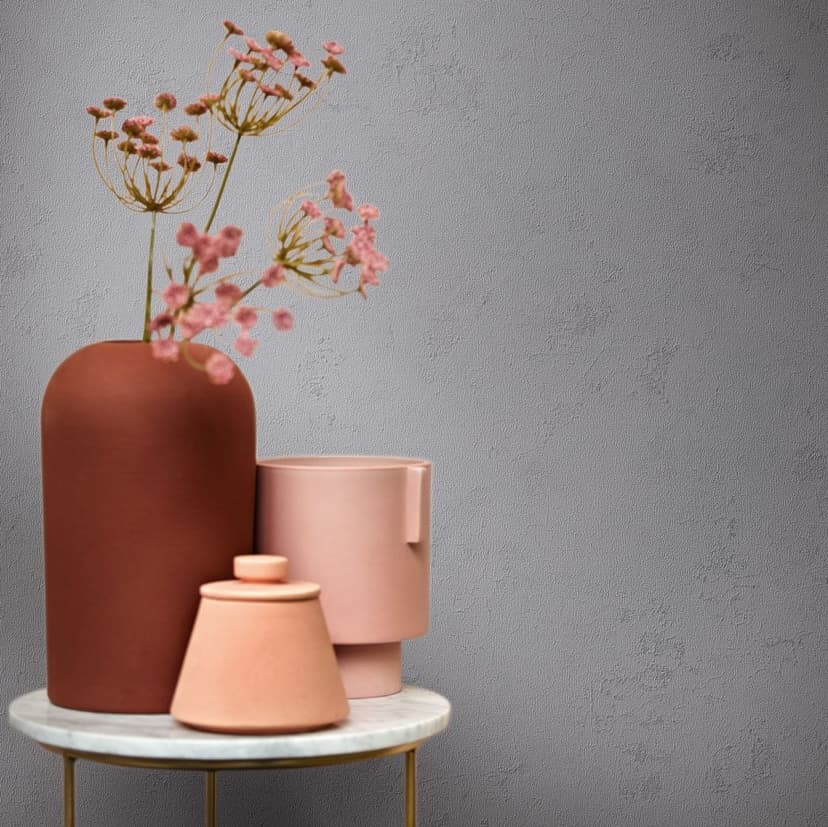 Papel pintado no tejido con textura gris de aspecto escayola moderno