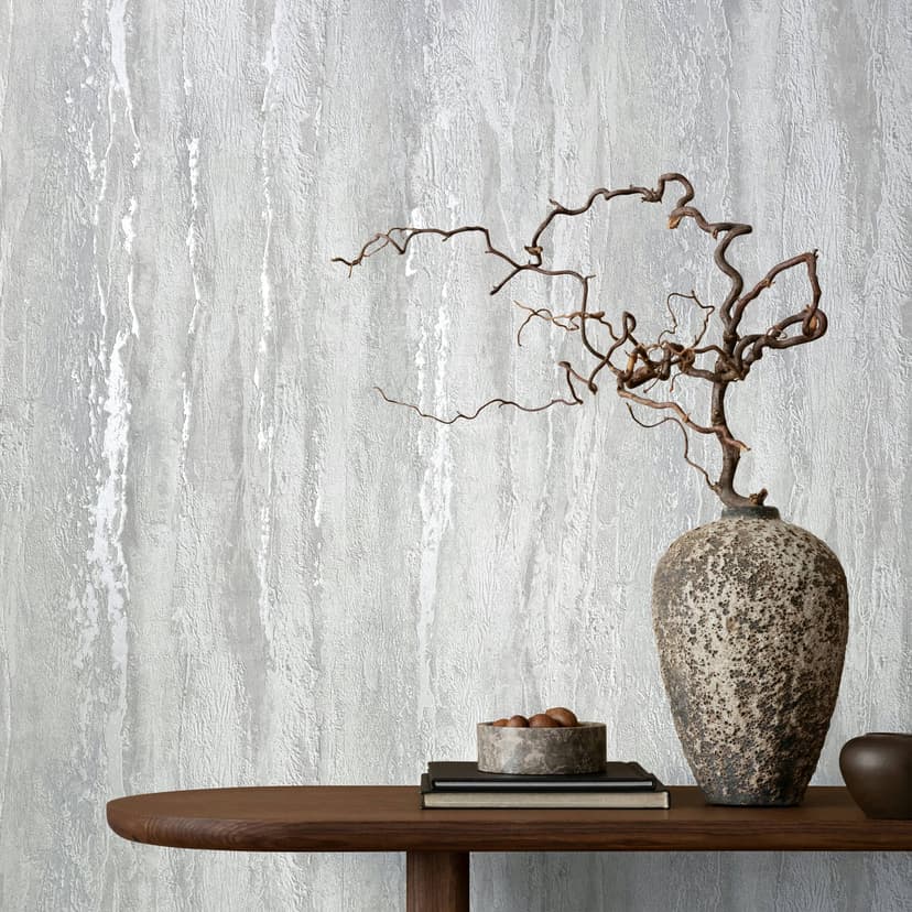 Papel pintado no tejido con aspecto de yeso gris brillante y de textura gruesa