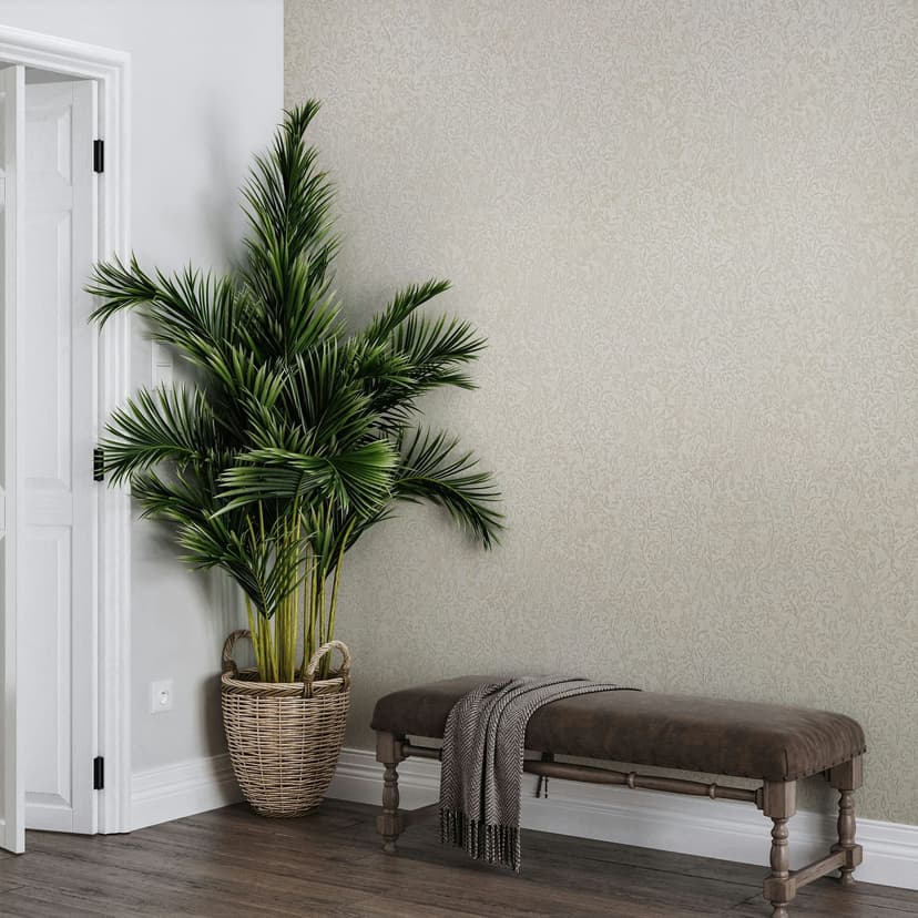 Papel pintado no tejido de color beige con motivo de hojas de naturaleza floral