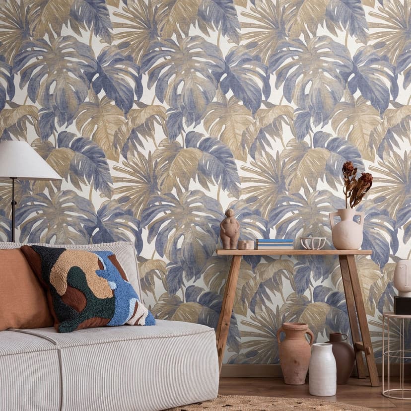 Papel pintado no tejido hojas tropicales en azul beige con monstera look moderno elegante