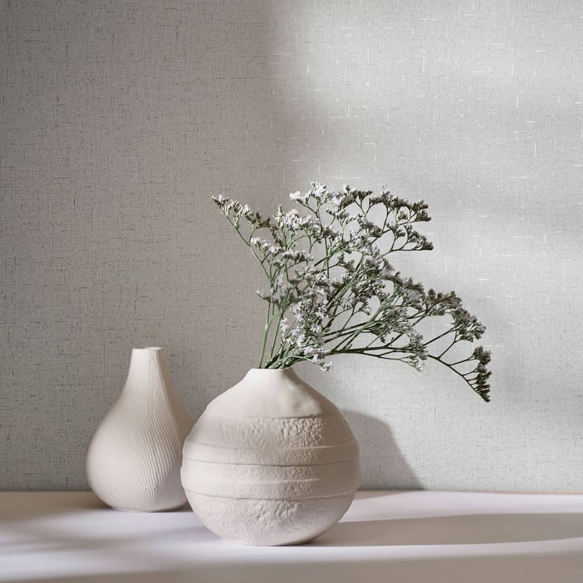 Papel pintado no tejido con textura lisa gris ligeramente brillante