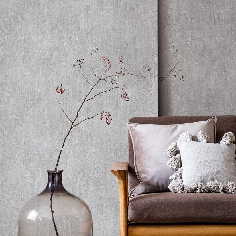 Papel pintado no tejido con motivo de hojas texturadas floral gris