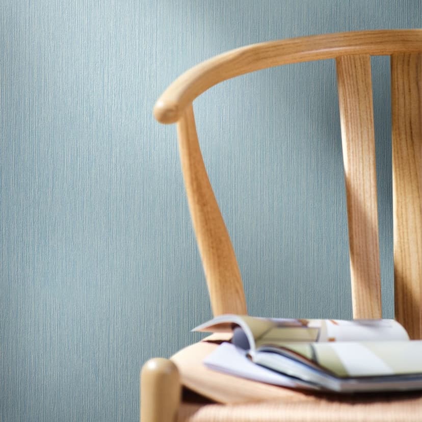 Papel pintado no tejido de líneas finas y textura ligera azul liso