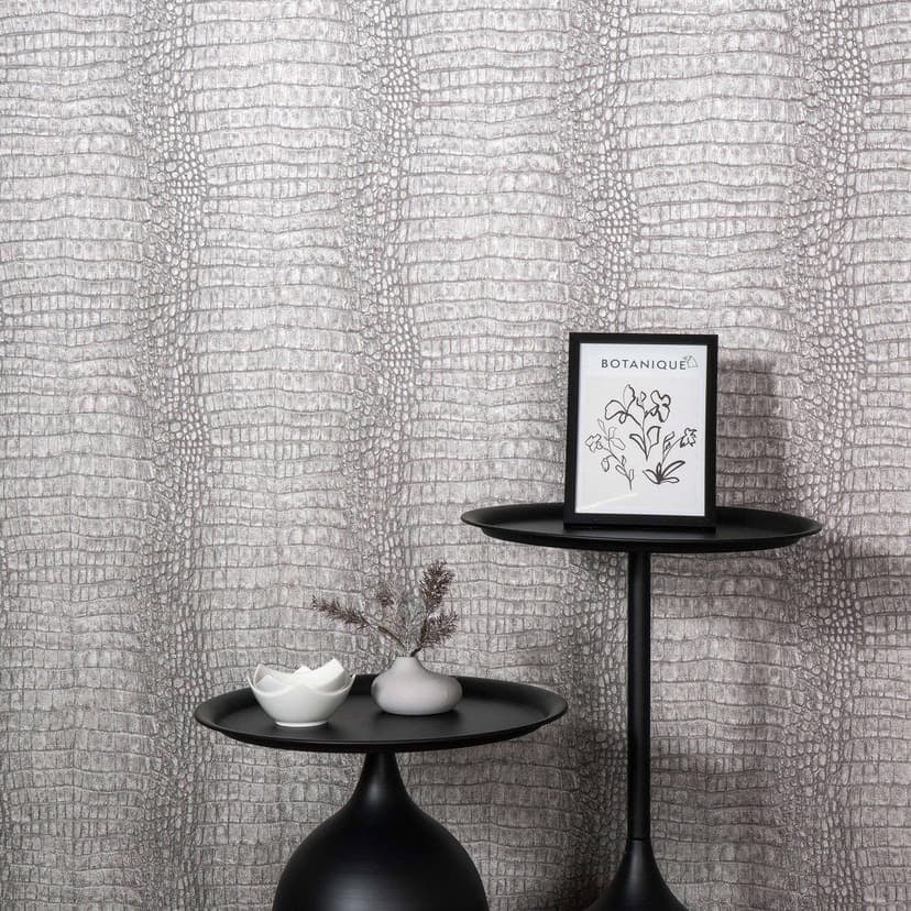 Papel pintado no tejido en gris con aspecto de cocodrilo, discretamente moderno y de llamativa textura