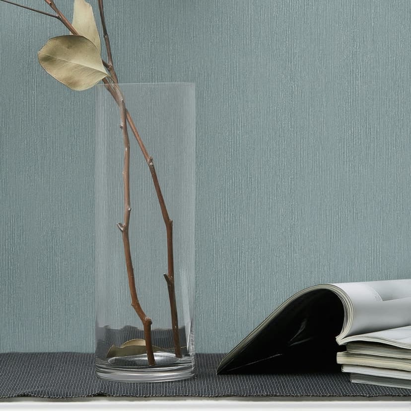 Papel pintado no tejido de aspecto textil con superficie texturada azul liso